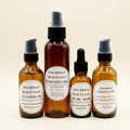 Lisa Monae Beauty Dull Skin Care Set with four amber skincare bottles